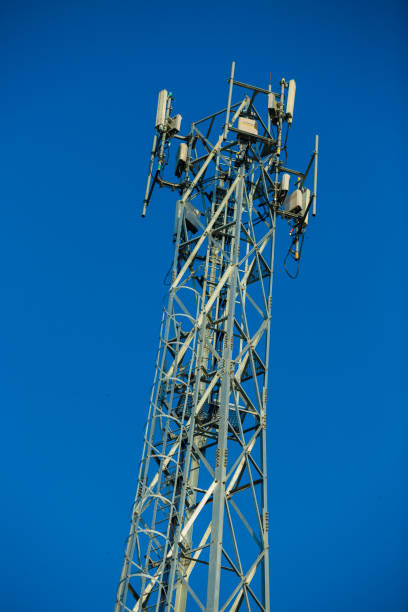istock Mobile receiver and transmitter antenna tower,antenna tower building with the blue sky. 1046840548