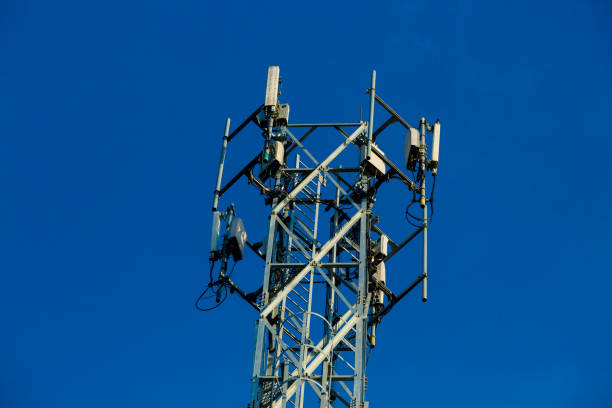 istock Mobile receiver and transmitter antenna tower,antenna tower building with the blue sky. 1046840656