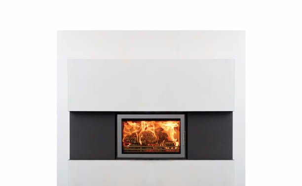 istock Burning fireplace in living room isolated on white. Modern architecture 1046840902