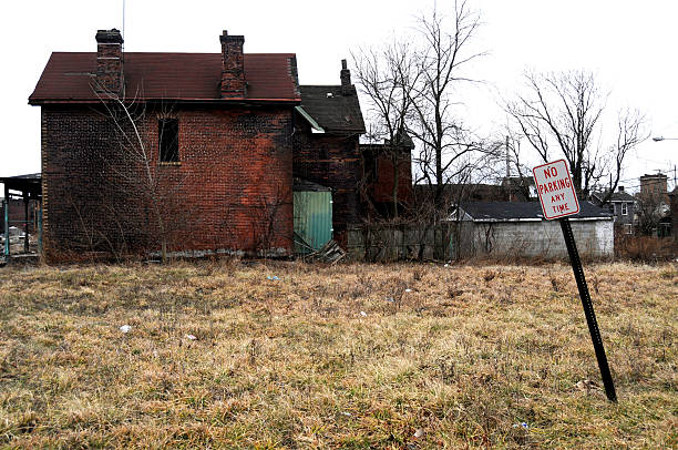 istock No parking sign on abandoned lot 104684713