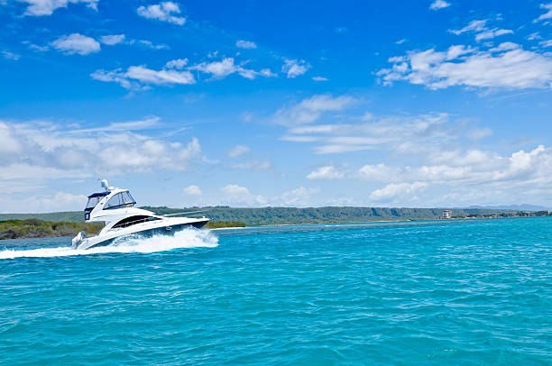 istock Luxury Yachts anchored in a tropical exotic island beach 104684995