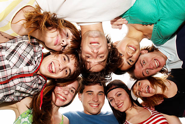 Cheerful young people having fun summer holidays. stock photo