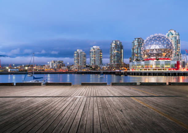 empty wooden plank front of vancouver night downtown skyline empty wooden plank front of vancouver night downtown skyline,Canada. false creek stock pictures, royalty-free photos & images