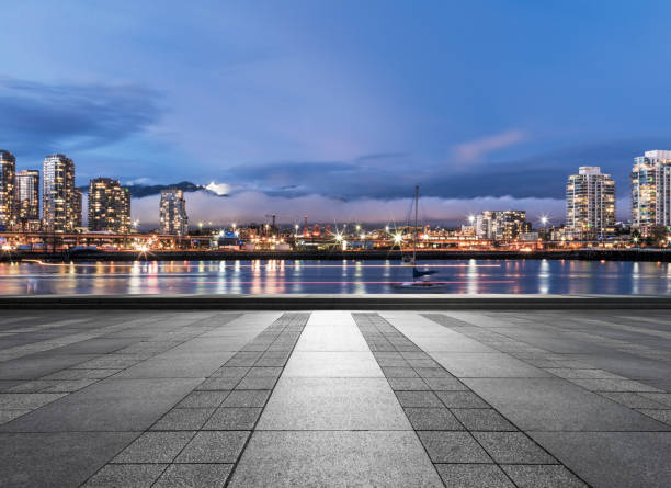 istock empty square front of vancouver harbor skyline 1046859936
