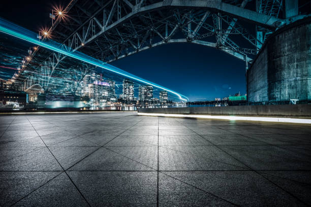 empty ground under Granville street bridge,Vancouver empty ground under Granville street bridge,Vancouver,BC,Canada. empty road stock pictures, royalty-free photos & images