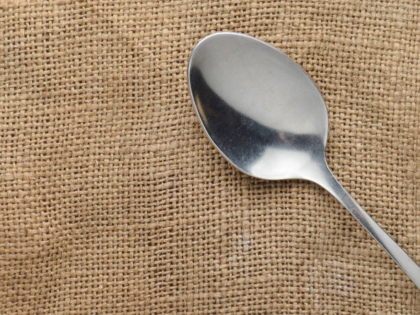 istock Spoon on a napkin from a baggie. Top view. Cutlery. 1046877542