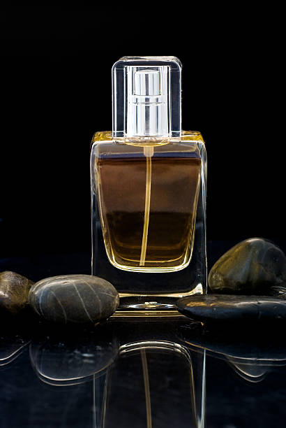 istock Bottle of Perfum on black 104687968