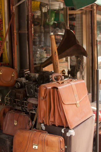 istock Vintage items,  bags, old gramaphone, briefcase. 1046880320