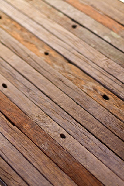 istock Old textured wood floor background 1046880516
