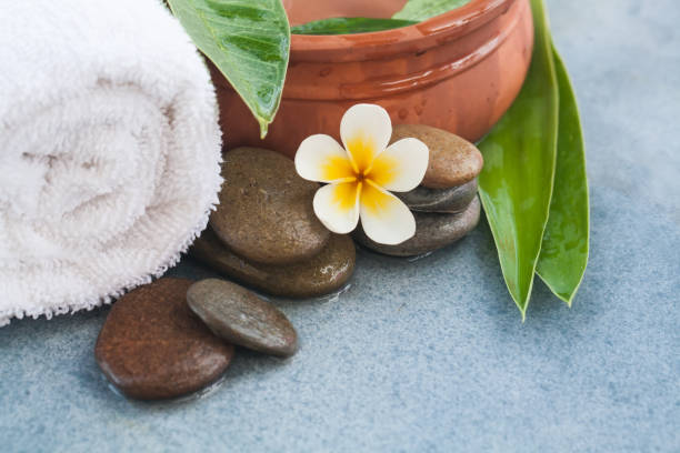 istock spa tropical organic objects and stones for relax massage treatment 1046889276