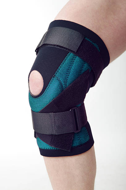 knie pad - human knee physical injury bandage muscular build stock-fotos und bilder