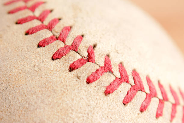 istock Sports Equipment old Baseball background texture 1046894716