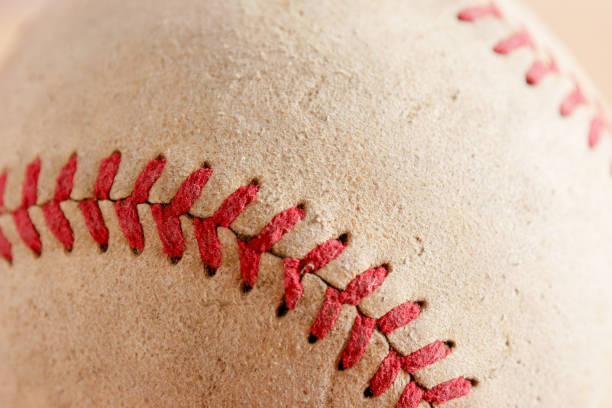 istock Sports Equipment old Baseball background texture 1046896846