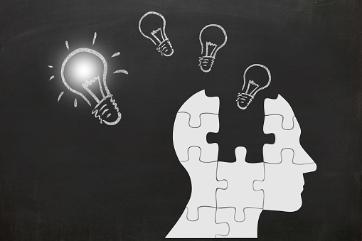 Puzzle head silhouette mind brain memory creative bright idea