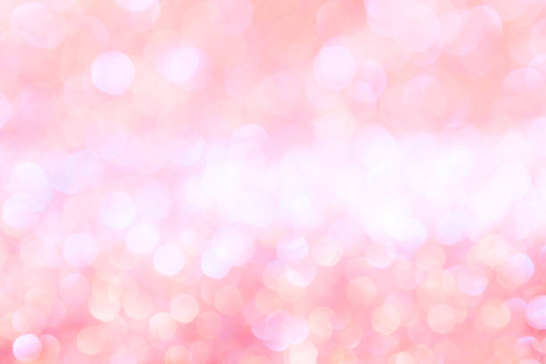 istock abstract background pink light bokeh christmas holiday 1046911714