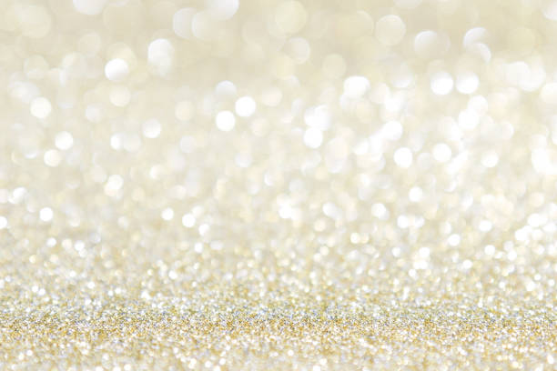istock abstract background gold light bokeh christmas holiday 1046911842