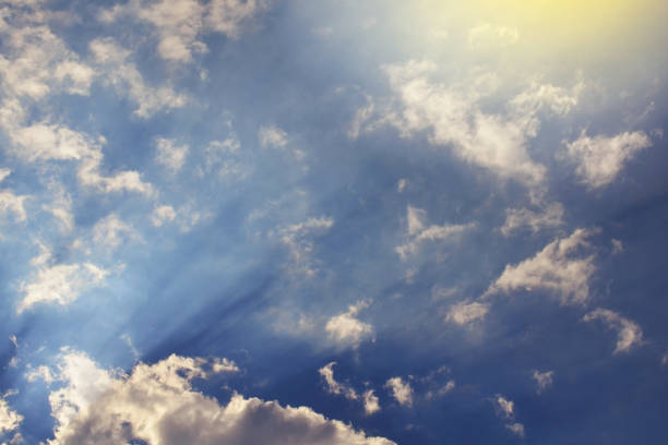 istock Nature background. Fluffy soft clouds in sky toned. 1046911894