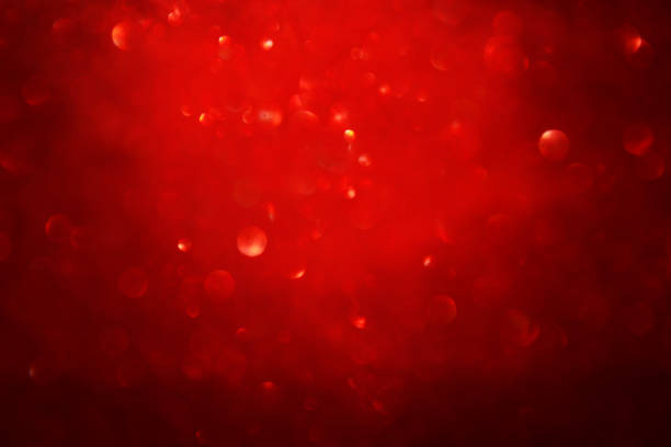 istock Red, black and gold glitter lights background. defocused. 1046911920