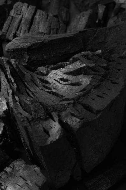 istock Carbon on an isolated black background 1046912082
