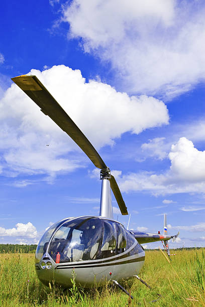 istock Helicopter on Field solar day 104691272
