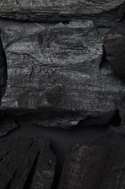 istock Carbon on an isolated black background 1046914512