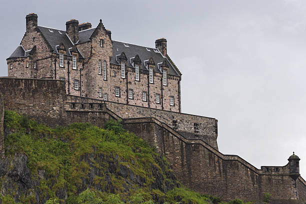 Taken for the entrance to Edinburgh Castle in Edinburgh Scotland, off in the distance is famous Arthur's Seat on the outskirts of town.  This is a favorite site for tourists who come to visit Edinburgh.