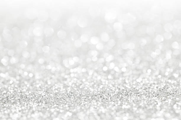 istock Glittery shiny lights silver abstract Christmas background 1046921852