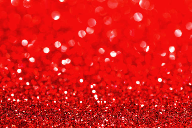 istock Abstract glitter bokeh holiday red background 1046921860