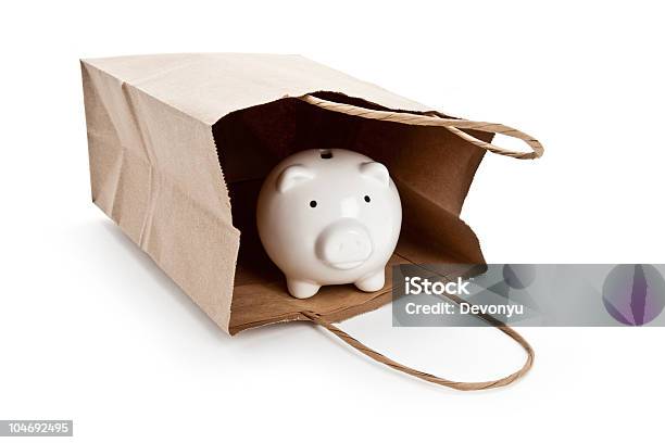 Brown Paper Shopping Bag And Piggy Bank Stock Photo - Download Image Now - Bag, Brown, Buying