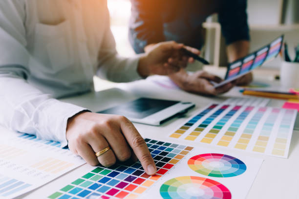istock Young startup graphic designer entrepreneurs working in home office. 1046928406