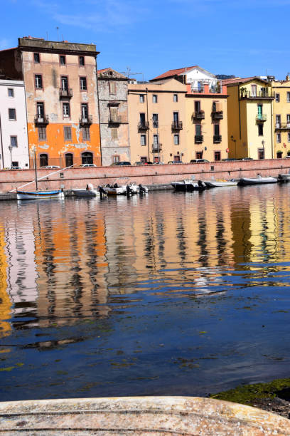 istock house and boat reflections in the river surface 1046931154