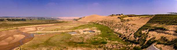Drought and erosion at the Ordos Desert, Inner Mongolia stock photo