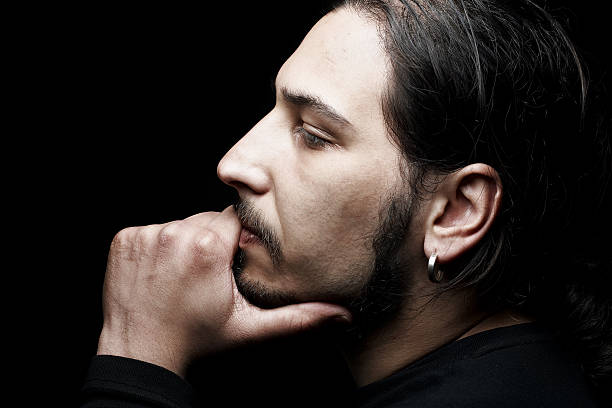 istock handsome caucasian man on black background 104693779