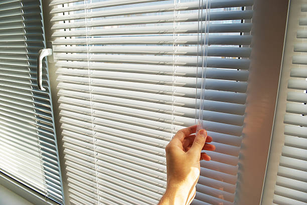 istock Hand open the jalousie 104694242