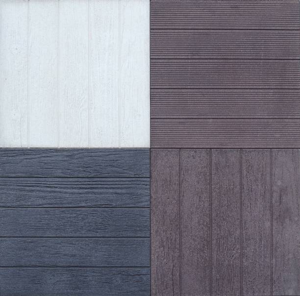 istock Outdoor stoneware tiles with wood effect. Samples, close up. 1046943414