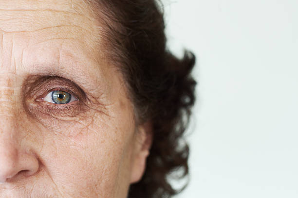 istock half face of an old woman 104694895