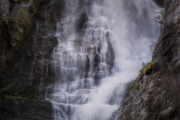 istock Dark Blue stream waterfall closeup background , beauty in nature 1046955376