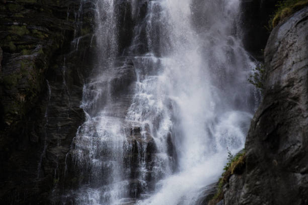 istock Dark Blue stream waterfall closeup background , beauty in nature 1046955394