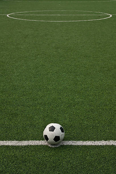 istock Ball on green field 104695637
