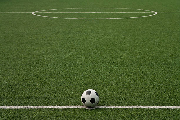 istock Ball on green field 104695640