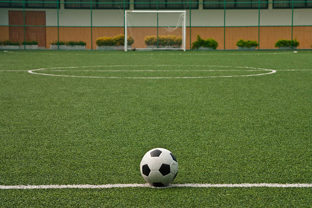 istock Ball on green field 104695641