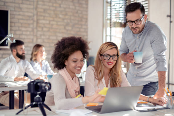 istock Young business people working  together 1046957652