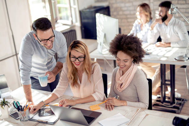 istock Business team sitting in office and planning work 1046957672
