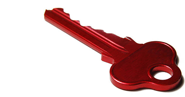 Red Key isolated on white stock photo