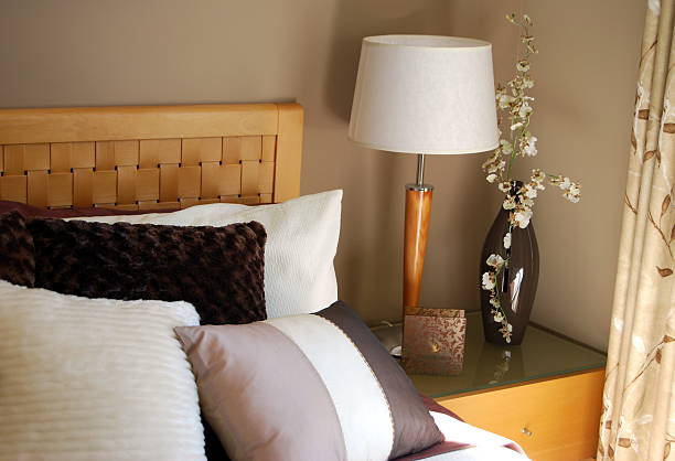 bedroom setting in neutral tones stock photo