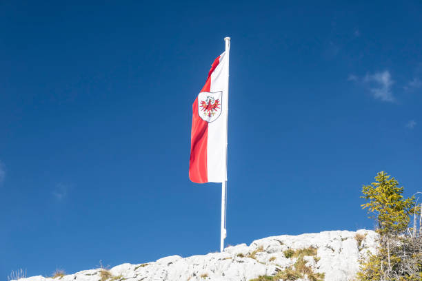 Tyrolean flag in the alps (Rofan, Achensee)