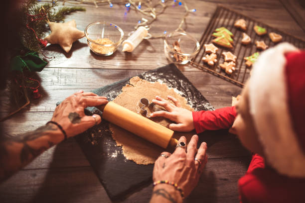 istock Father and son making cookies for Christmas 1046962388