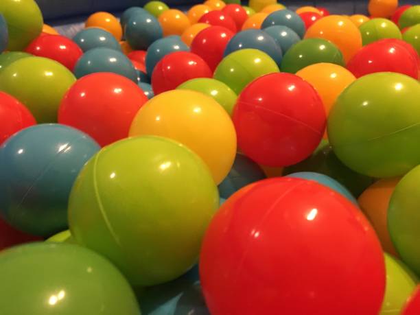 istock Colorful plastic balls in pool 1046965832