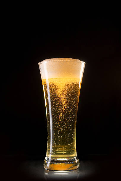 istock Beer glass with bubbles whirl 104696643