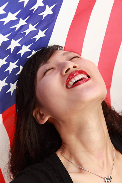 istock woman with an USA flag 104697085